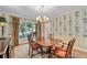 Dining room featuring floral wallpaper and chandelier at 5049 Lake Ter, Marietta, GA 30068