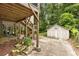 Backyard featuring a patio, staircase, and a shed at 711 Greenview Ne Ave, Atlanta, GA 30305