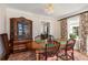 Formal dining room features hardwood floors, classic wainscoting, and a bright window at 711 Greenview Ne Ave, Atlanta, GA 30305