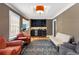 Cozy living room with hardwood floors, stylish furnishings, and a wet bar at 711 Greenview Ne Ave, Atlanta, GA 30305