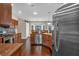 Spacious kitchen with stainless steel appliances, custom cabinets, and hardwood floors at 812 Roget Way, Lawrenceville, GA 30045