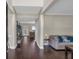 Bright entryway and living room with hardwood floors, neutral colors, and ample natural light at 812 Roget Way, Lawrenceville, GA 30045