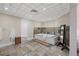 Elegant bathroom with large tub, neutral tile, and a minimalist aesthetic at 1005 Cromwell Cv, Snellville, GA 30078