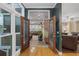 Grand entry features double doors and glass panes, flooding the space with light and showcasing seamless transition to the living area at 1005 Cromwell Cv, Snellville, GA 30078