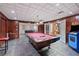 Inviting game room with pool table, arcade games, and ample space for entertainment at 1005 Cromwell Cv, Snellville, GA 30078