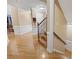Hallway with staircase and wooden flooring at 1005 Cromwell Cv, Snellville, GA 30078
