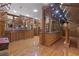 Entertainment room featuring built-in shelving, wood trim, and a TV at 1005 Cromwell Cv, Snellville, GA 30078