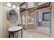 Luxurious bathroom showcases a jetted tub, dual showers, and a stylish vanity at 1005 Cromwell Cv, Snellville, GA 30078