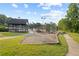 Community playground and picnic area with a variety of play structures and recreational facilities for children at 1005 Cromwell Cv, Snellville, GA 30078