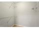 Walk-in closet features neutral walls, tile flooring, and wire shelving at 1150 Nw Collier Rd # K24, Atlanta, GA 30318