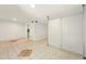Bright living room with tile flooring and access to the kitchen, featuring modern design at 1150 Nw Collier Rd # K24, Atlanta, GA 30318