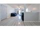 Inviting living room featuring vaulted ceilings, tile floors, and neutral color scheme at 151 River Park Cir, Mcdonough, GA 30252