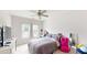Bright bedroom with large windows, plush carpet and a whimsical design, creating an inviting and cheerful space at 309 Daffodil Dr, Temple, GA 30179