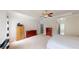 Bright primary bedroom with tray ceiling, carpet, and natural light at 309 Daffodil Dr, Temple, GA 30179
