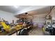 Spacious garage offering ample room for parking and storage, with various tools and equipment neatly organized at 309 Daffodil Dr, Temple, GA 30179