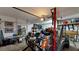 Well-organized garage featuring extensive storage options and a variety of tools and equipment, catering to functionality at 309 Daffodil Dr, Temple, GA 30179