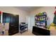 Functional storage room featuring a closet, shelving for organization, and space for various household items at 309 Daffodil Dr, Temple, GA 30179