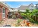 Brick patio and outdoor grill in a private backyard at 67 Delmont Ne Dr, Atlanta, GA 30305