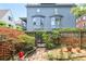 Exterior of home with brick courtyard and wrought iron gate at 67 Delmont Ne Dr, Atlanta, GA 30305