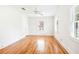 Spacious bedroom with hardwood floors, ceiling fan and natural light at 67 Delmont Ne Dr, Atlanta, GA 30305