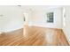 Sunlit living room featuring hardwood floors and freshly painted neutral walls for a modern aesthetic at 67 Delmont Ne Dr, Atlanta, GA 30305