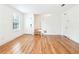 Bright living room features hardwood floors, large windows, and stairway access at 67 Delmont Ne Dr, Atlanta, GA 30305