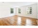 Inviting living room showcases hardwood floors and bright windows for natural lighting at 67 Delmont Ne Dr, Atlanta, GA 30305