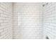 Modern shower with white subway tile surround and contemporary fixtures at 67 Delmont Ne Dr, Atlanta, GA 30305