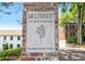 Delmont by Hedgewood sign with established year, set against a backdrop of community homes at 67 Delmont Ne Dr, Atlanta, GA 30305