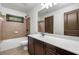 Classic bathroom with vanity, tub-shower, and tile flooring, perfect for modern living at 2005 Eagle Rdg, Roswell, GA 30076