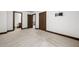 Bedroom featuring neutral carpet, white walls, and multiple entry doors at 2005 Eagle Rdg, Roswell, GA 30076