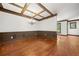 Spacious dining room features decorative ceilings, chandelier, hardwood floors and wall paneling at 2005 Eagle Rdg, Roswell, GA 30076