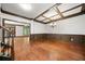 Elegant dining room boasts hardwood floors, coffered ceilings, crown molding, and decorative chandelier at 2005 Eagle Rdg, Roswell, GA 30076