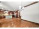 Open concept kitchen with a central island and stainless steel appliances, and hardwood floors at 2005 Eagle Rdg, Roswell, GA 30076