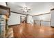 Spacious living room with hardwood floors, fireplace, and natural light at 2005 Eagle Rdg, Roswell, GA 30076
