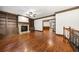 Living room with hardwood floors, fireplace, and built-in shelves at 2005 Eagle Rdg, Roswell, GA 30076