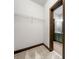 Walk-in closet with wire shelving and access to bathroom at 2005 Eagle Rdg, Roswell, GA 30076