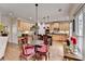 Eat-in kitchen featuring updated stainless appliances, light wood cabinets and room for a table and chairs at 2730 Henderson Chase Ct, Tucker, GA 30084