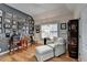 Office featuring wall decor and hardwood floors at 2730 Henderson Chase Ct, Tucker, GA 30084