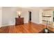 Elegant hallway with beautiful hardwood floors and seamless transitions to other rooms at 3880 Admiral Dr, Chamblee, GA 30341
