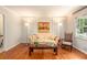 Inviting living room with hardwood floors, neutral walls, and classic decor elements at 3880 Admiral Dr, Chamblee, GA 30341