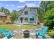 This backyard offers a stone patio area and seating for outdoor enjoyment at 1589 Delano Dr, Decatur, GA 30032