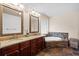Bathroom featuring a double vanity with granite countertop, tile floor, and a soaking tub at 1589 Delano Dr, Decatur, GA 30032