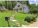Charming home with a landscaped front yard and inviting curb appeal at 1589 Delano Dr, Decatur, GA 30032
