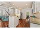 Well-lit kitchen featuring stainless steel appliances, granite countertops, and hardwood floors at 1589 Delano Dr, Decatur, GA 30032