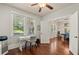 Bright office space with hardwood floors, large windows, and backyard views at 1589 Delano Dr, Decatur, GA 30032