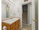 Bathroom featuring a sink and vanity combo and a stairway at 163 Silver Fox Trail Trl, Dallas, GA 30157