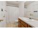 Bright bathroom featuring a shower with curtain, a sink and vanity combo at 163 Silver Fox Trail Trl, Dallas, GA 30157