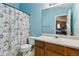 Bathroom featuring nautical-themed shower curtain, vanity, and a toilet at 163 Silver Fox Trail Trl, Dallas, GA 30157