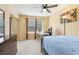 Comfortable bedroom featuring a ceiling fan, natural light, and a closet at 163 Silver Fox Trail Trl, Dallas, GA 30157